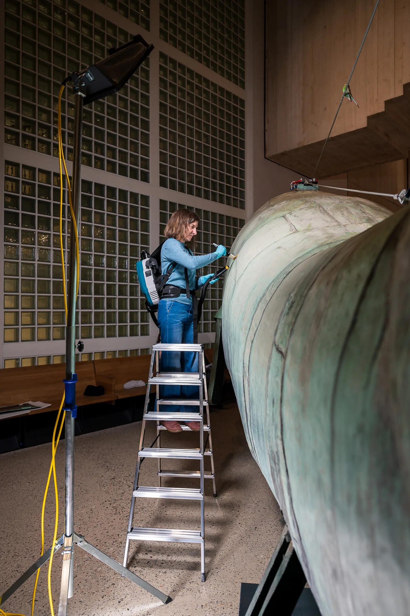 Conservator at work on “Poldi”, Wien Museum 2024
