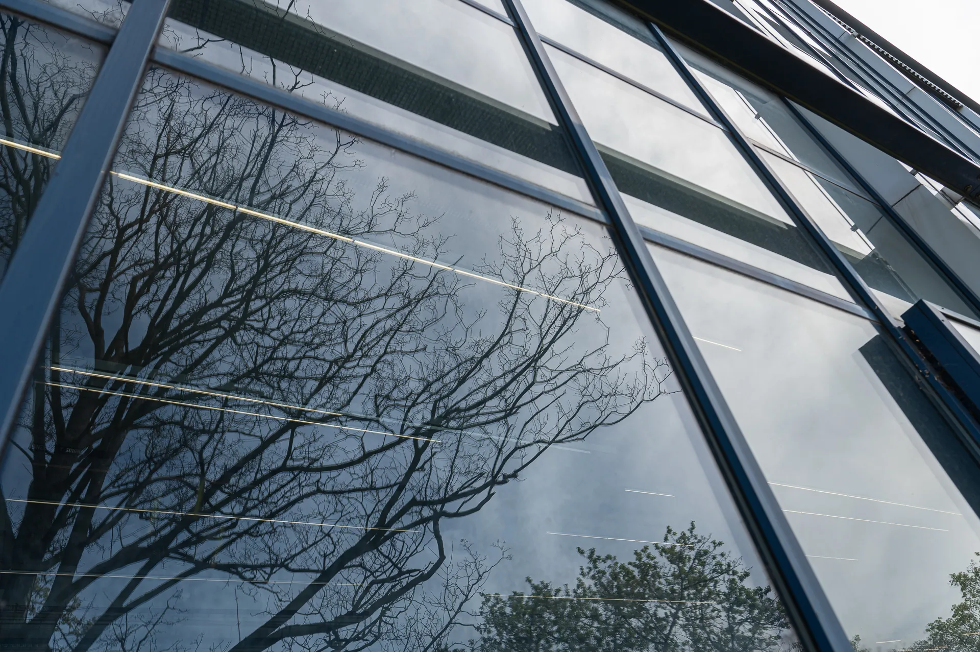 Glass facade with reflections – Foto Arsenal Wien construction site, April 2024