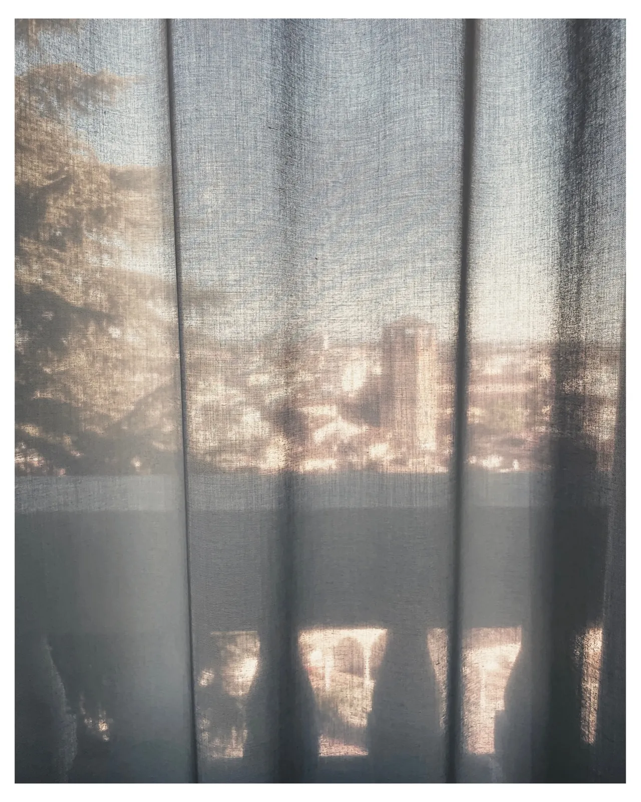 Curtain and view over Udine – Mimmo Jodice. L'enigma della luce, Castello di Udine, 2025