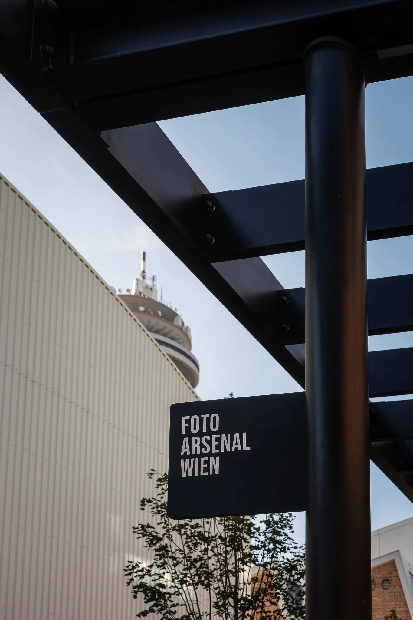 Foto Arsenal Wien sign below the tower – FOTO WIEN at Foto Arsenal Wien, October 2025