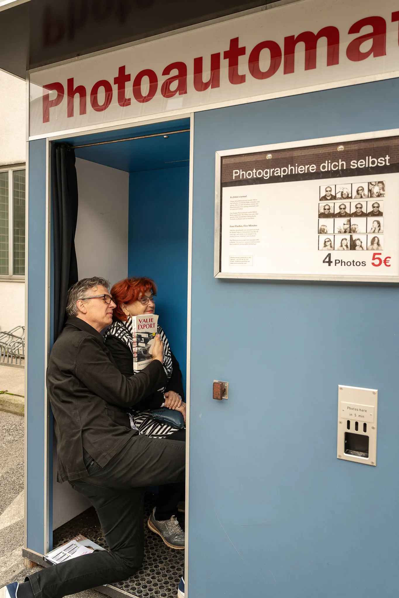 Felix Hoffmann, director of Foto Arsenal Wien, and VALIE EXPORT in the photo booth – FOTO WIEN at Foto Arsenal Wien, October 2025